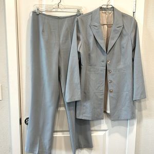 Baby blue suit with pearl buttons